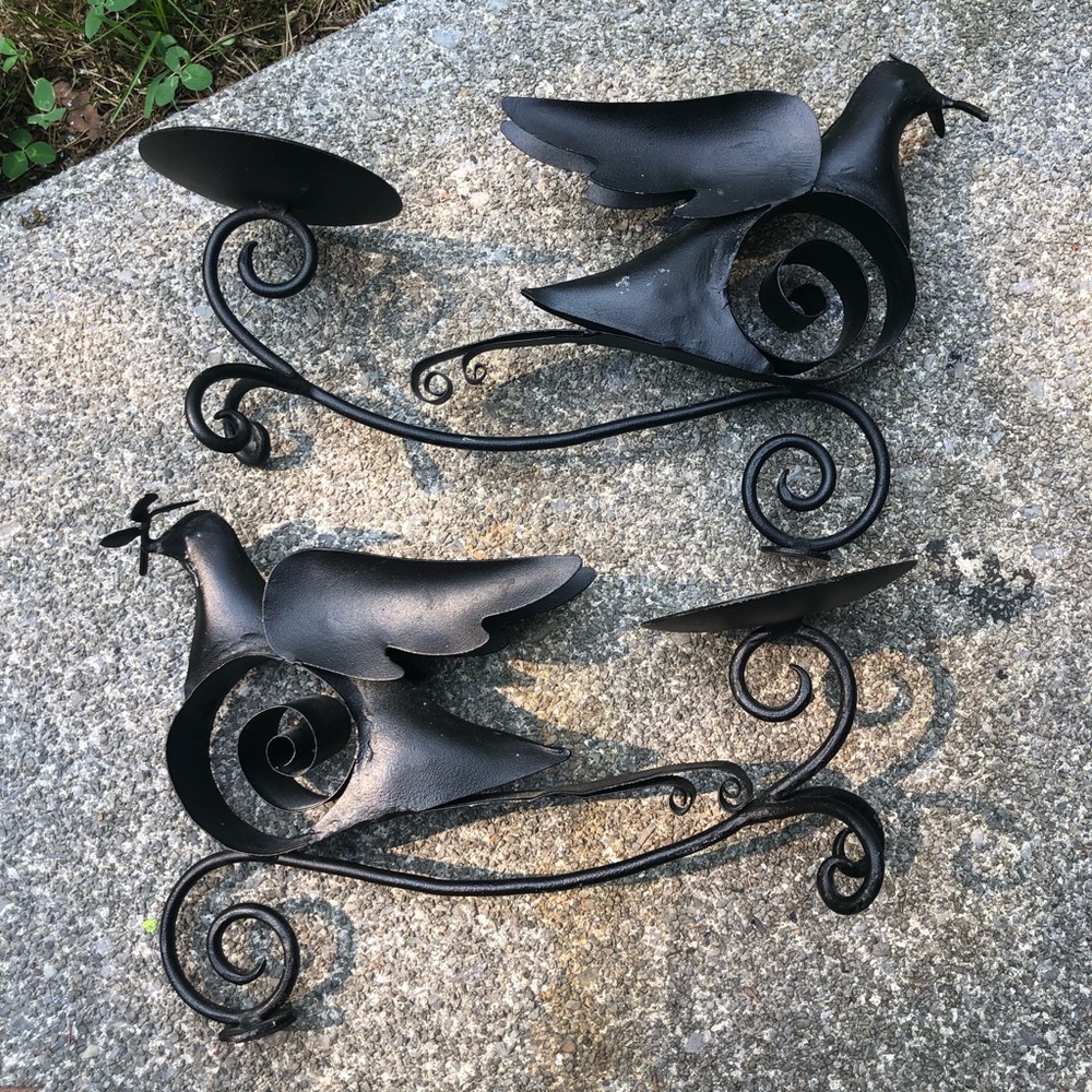 Metal dove with olive branch candle holder.